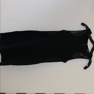 Black body con dress with see-through sides.